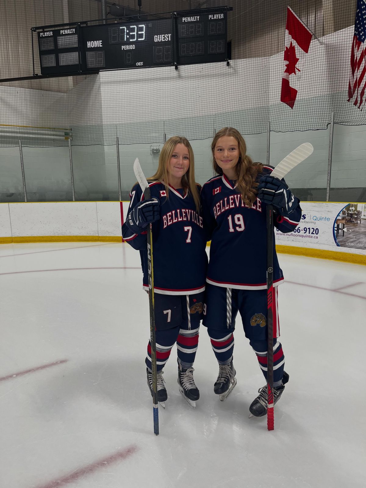 Rory (#19) with a Bearcats teammate on the ice